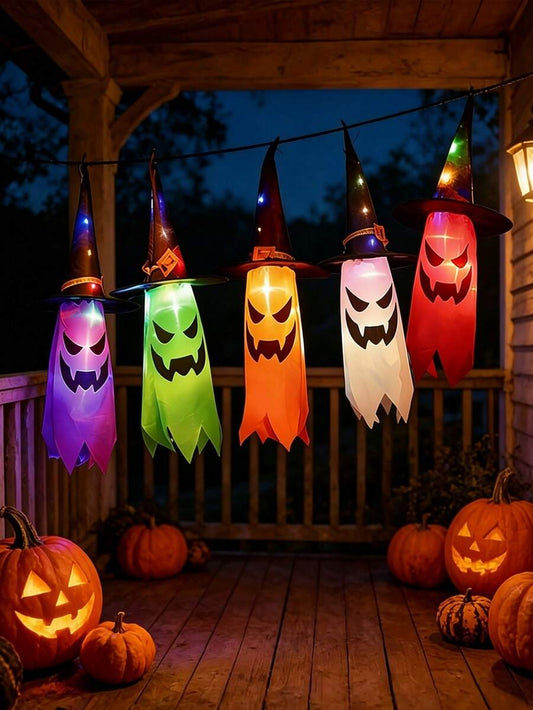 Five hanging black witch hats with multicolour LED lights