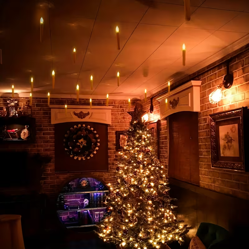 Indoor room styling with floating LED candles; illustrative arrangement may show a larger display. This listing supplies twelve candles and one wand-style remote; other decorations are not included.