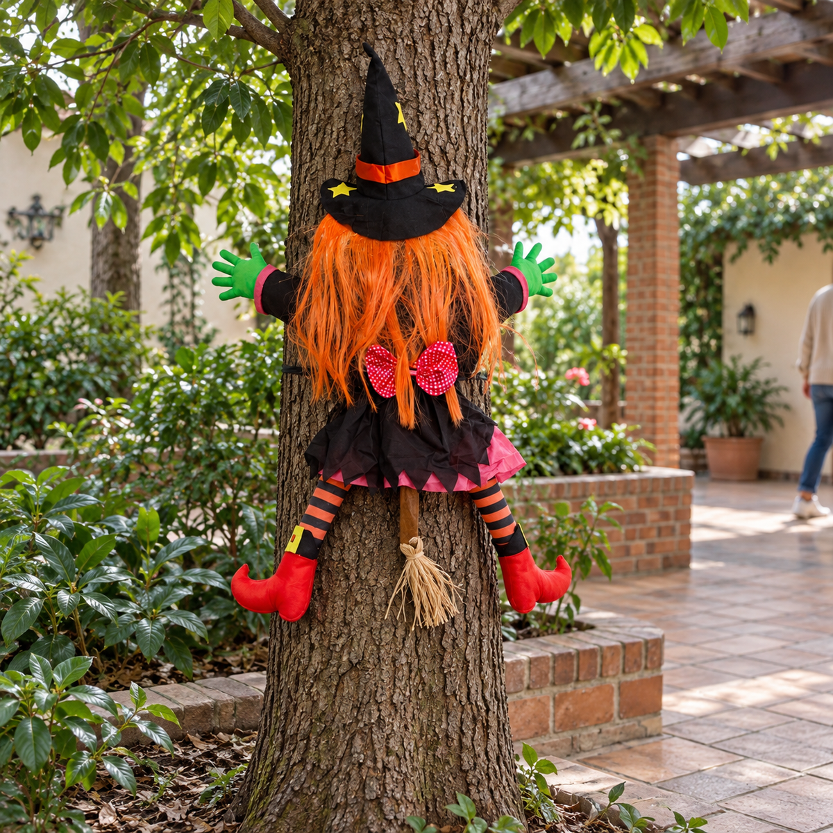 Crash Landing — orange-haired tree-crash witch decoration; illustrative styled product scene; background props not included