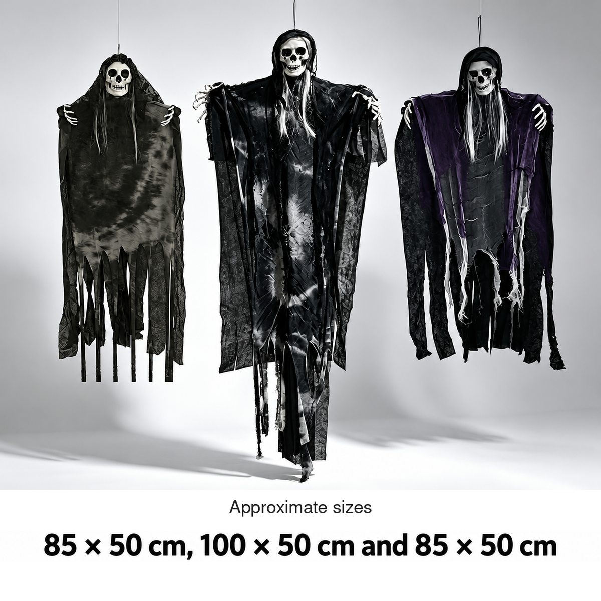 The Floating Coven three distinct hanging figures with size references: 85 × 50 cm, 100 × 50 cm and 85 × 50 cm.