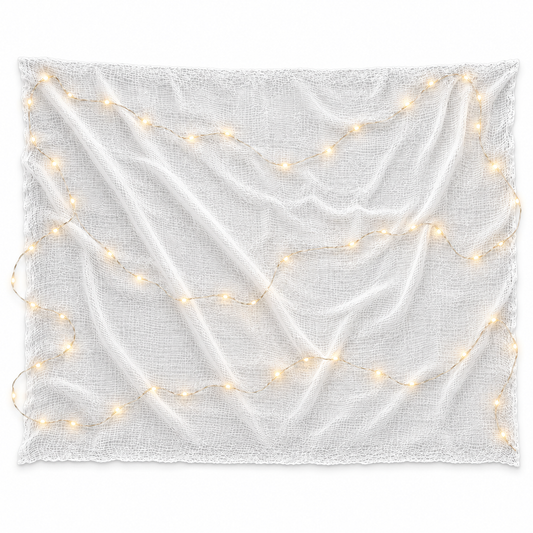 AI-generated product illustration of Ghostly Glow on white: intact white gauze with the included 50-LED string arranged across it. Light positions and brightness are illustrative; gauze is supplied untorn.
