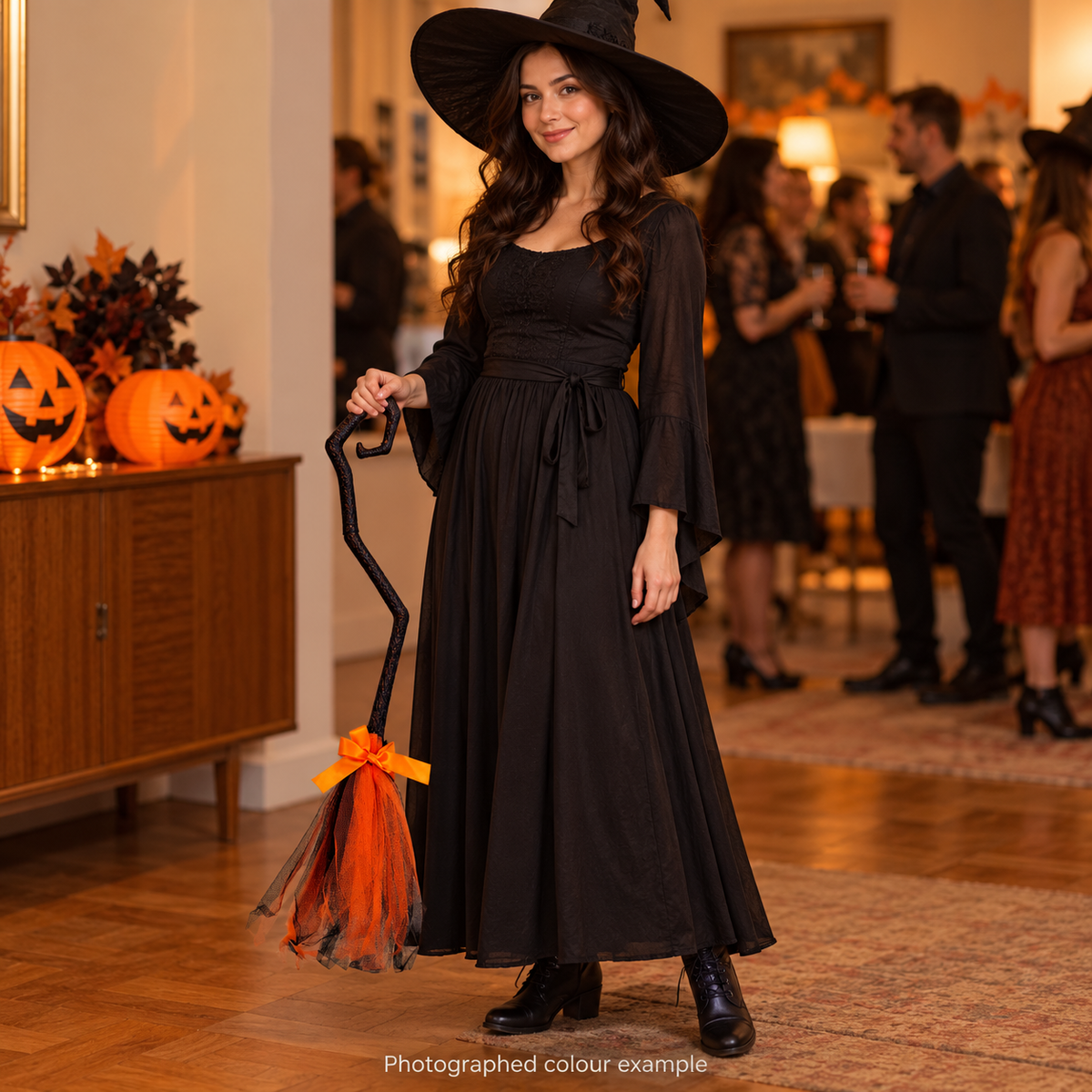 Sweep Me Away — witch broom; illustrative styled scene; background props not included; orange colour example, accent colour varies; separate included hook not pictured